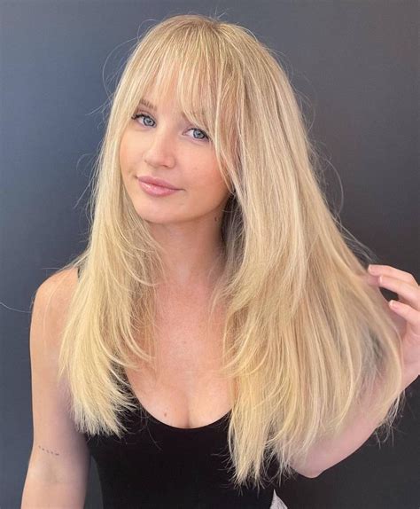 long blonde hair with bangs|long layered hair with round bangs.